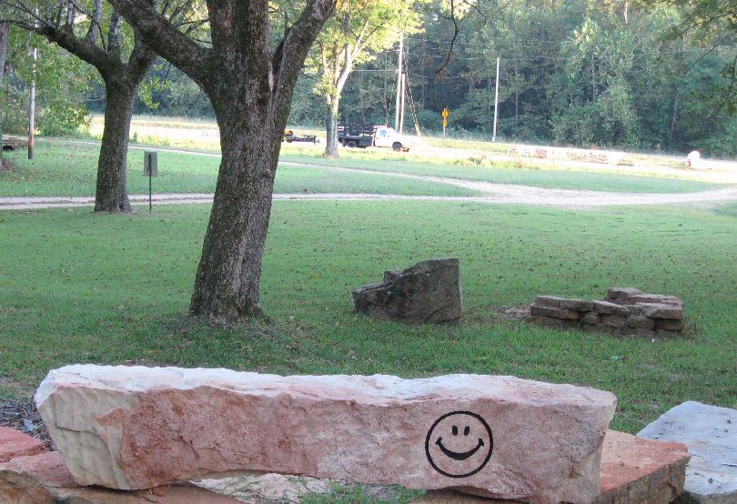 Stone smily rustic  stone face  Engraved Missouri  signs Monument  Rustic