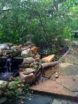 Patio with Small Waterfall Pond - Saint Louis, MO