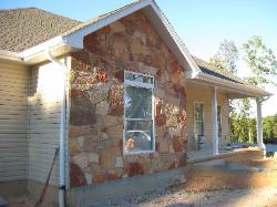 Warm Earth Tone Flagstone Veneer on home in Piedmont, MO